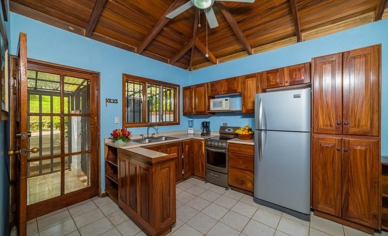 00_KRAIN_Los Almendros 4_ Kitchen Living Room_ Playa Ocotal.jpg